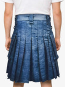 Blue pleated skirt worn by a person on a white background
