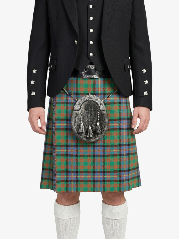 Person wearing a traditional Scottish kilt with a tartan pattern on a white background