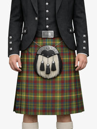 Person wearing a traditional Scottish kilt with a tartan pattern on a white background