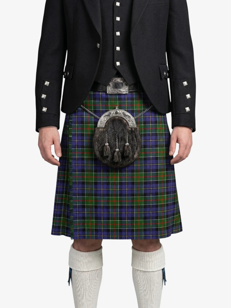 Person wearing a traditional Scottish kilt with a tartan pattern on a white background