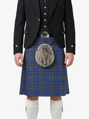 Person wearing a traditional Scottish kilt with a black jacket and white socks on a white background
