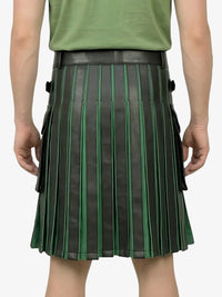 Person wearing a green and black pleated skirt on a white background