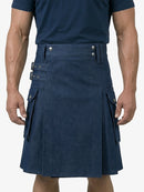 Man wearing a navy blue kilt on a white background