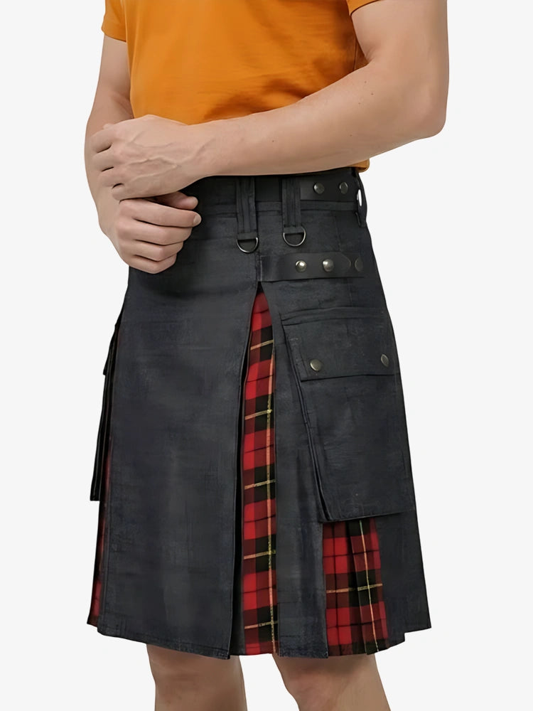 Person wearing a black kilt with red plaid accents on a white background