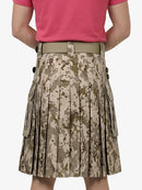 Person wearing a pink shirt and camouflage kilt on a white background
