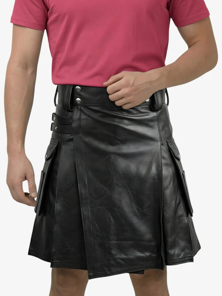 Person wearing a black leather kilt and pink shirt on a white background