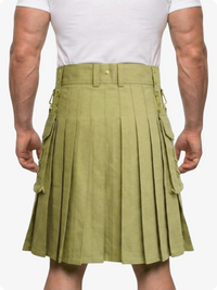 Person wearing a green kilt on a white background