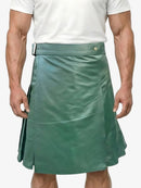 Green kilt worn by a person on a white background