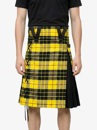 Person wearing a yellow and black plaid kilt on a white background