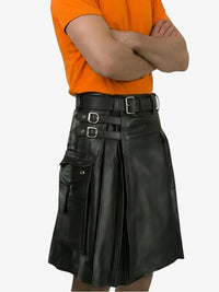 Person wearing a black leather kilt with a belt on a white background