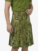 Person wearing a green camouflage skirt on a white background