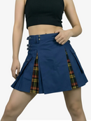 Blue pleated skirt with plaid accents worn by a person on a white background