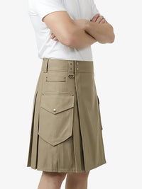 Person wearing a beige kilt on a white background