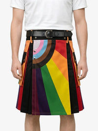 Person wearing a colorful striped skirt with a white shirt on a plain background