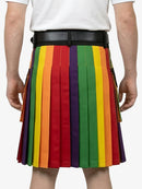 Person wearing a rainbow striped kilt on a white background