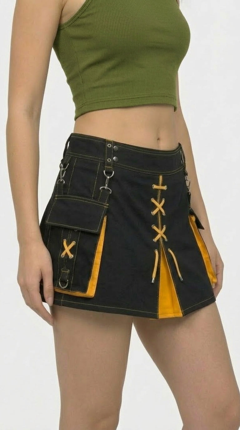 Person wearing a black and yellow skirt with a green top on a white background