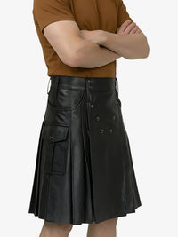 Person wearing a brown shirt and black leather kilt on a white background
