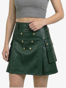 Green leather skirt with gold buttons worn by a person on a white background