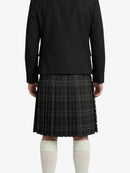 Person wearing a black jacket and plaid kilt on a white background