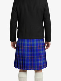 Person wearing a black jacket and blue plaid kilt on a white background