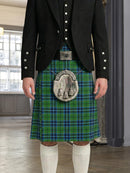 Person wearing a green plaid kilt with a jacket indoors.