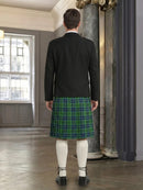 Man wearing a black jacket and green plaid kilt in an elegant room.