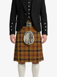 Person wearing a traditional Scottish kilt with a black jacket on a white background