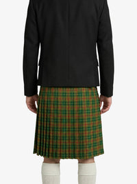 Person wearing a black jacket and green plaid kilt on a white background