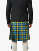 Person wearing a black coat over a blue and yellow plaid skirt on a white background