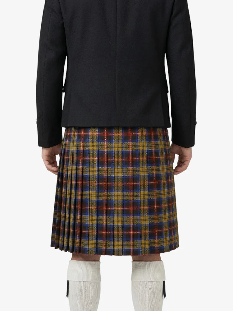 Person wearing a black jacket and plaid skirt on a white background