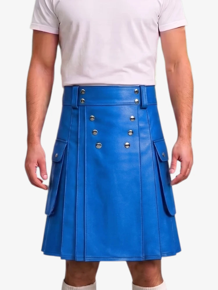 A bright blue faux-leather kilt skirt with silver-tone metal studs and flap pockets, shown on a model wearing a white t-shirt against a light gray background.