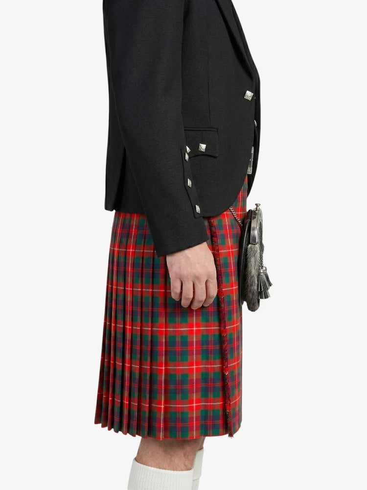 Person wearing a black jacket and red plaid kilt on a white background