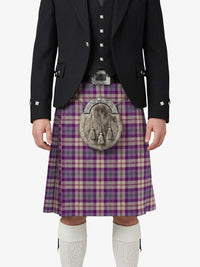 Person wearing a traditional Scottish kilt with a purple plaid pattern on a white background
