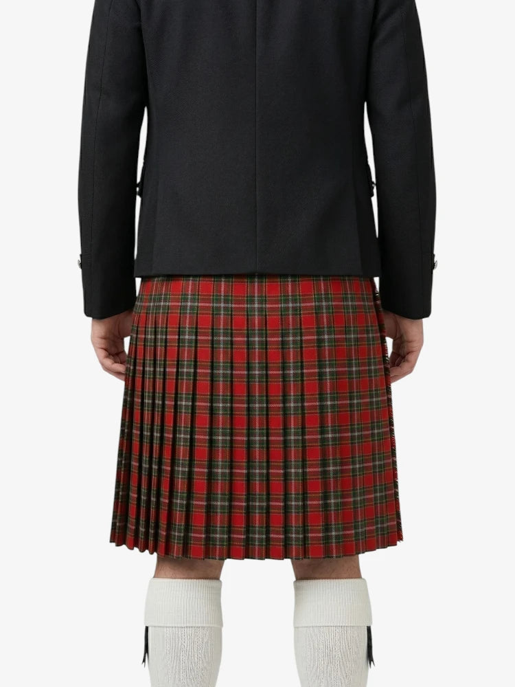 Person wearing a black jacket and red plaid kilt on a white background
