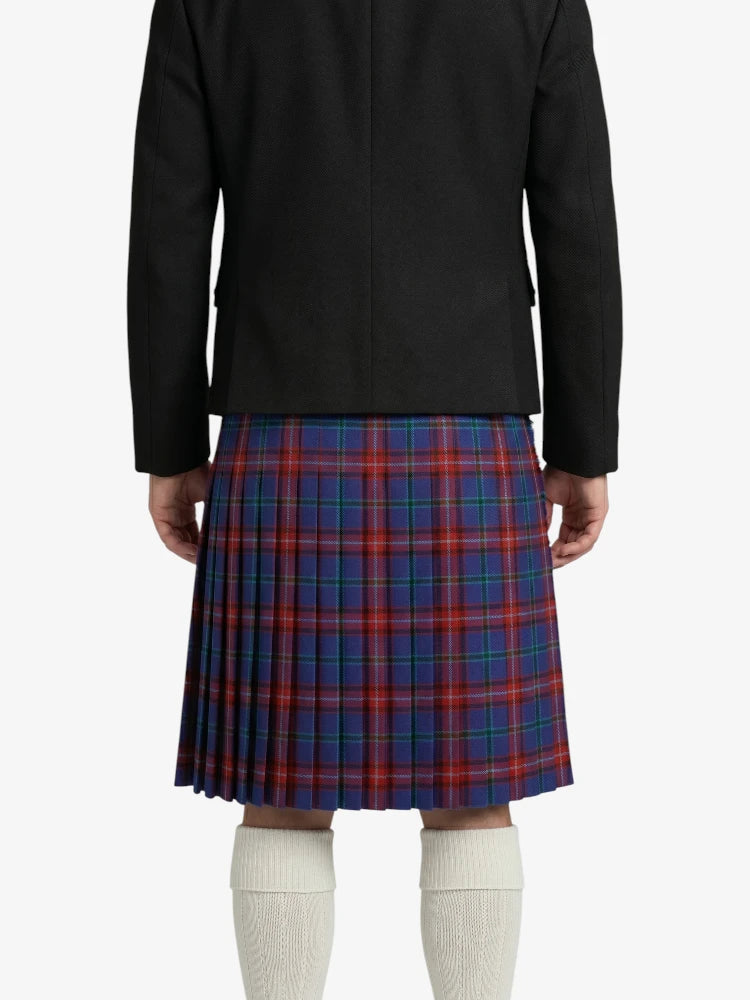 Person wearing a black jacket and red plaid kilt on a white background