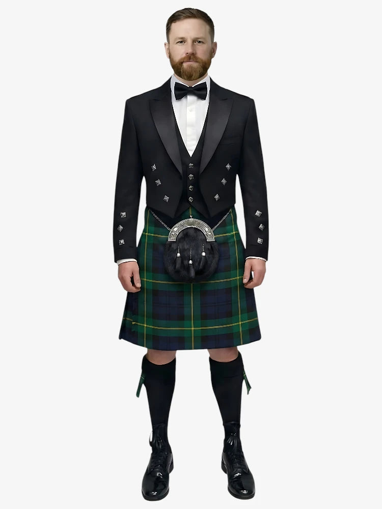 Man wearing a traditional Scottish gordon tartan kilt with a white shirt, black prince charlie jacket, and bow tie on a white background.