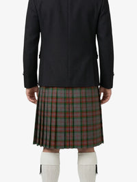 Person wearing a black jacket and green plaid kilt on a white background