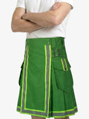 Green kilt with reflective stripes worn by a person on a white background