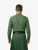 Man wearing a green shirt and kilt on a white background