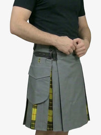 Person wearing a gray kilt with yellow plaid accents on a white background