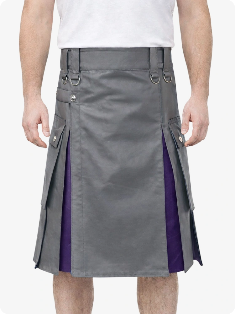 Gray and purple kilt worn by a person on a white background