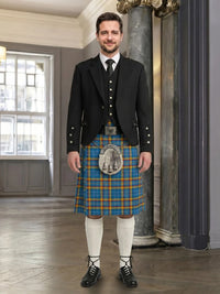 Man wearing a traditional Scottish kilt in a formal setting