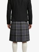 Person wearing a black jacket and plaid kilt on a white background
