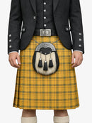 Person wearing a yellow tartan kilt with a dark jacket on a white background
