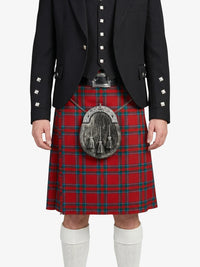 Person wearing a red tartan kilt with a black jacket on a white background