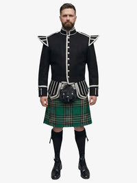 Man wearing a black doublet jacket with white accents and a irish national plaid kilt on a white background