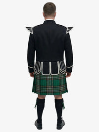 Person wearing a black doublet jacket and irish national plaid tartan kilt on a white background