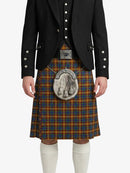 Person wearing a black jacket and plaid kilt with a decorative sporran on a white background