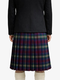 Person wearing a black coat and plaid kilt on a white background