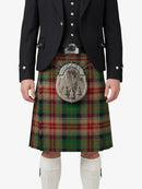 Person wearing a traditional Scottish kilt with a tartan pattern on a white background